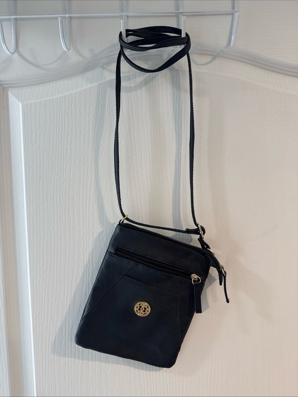 Black Crossbody Bag with Gold Logo Accent